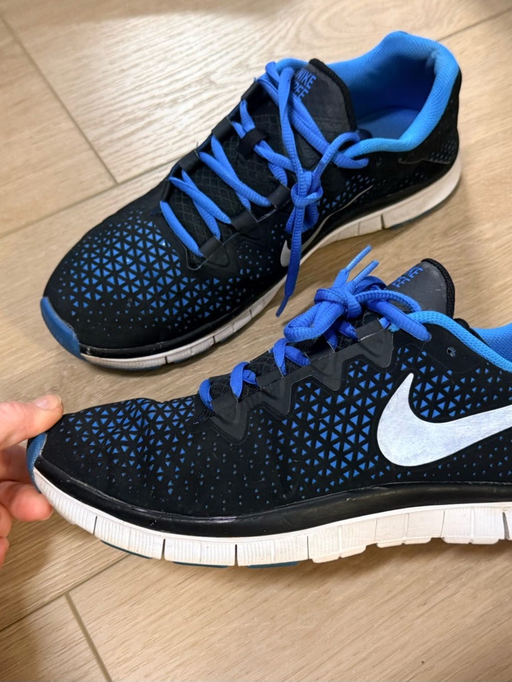 Nike Black Trainers with Blue Accents